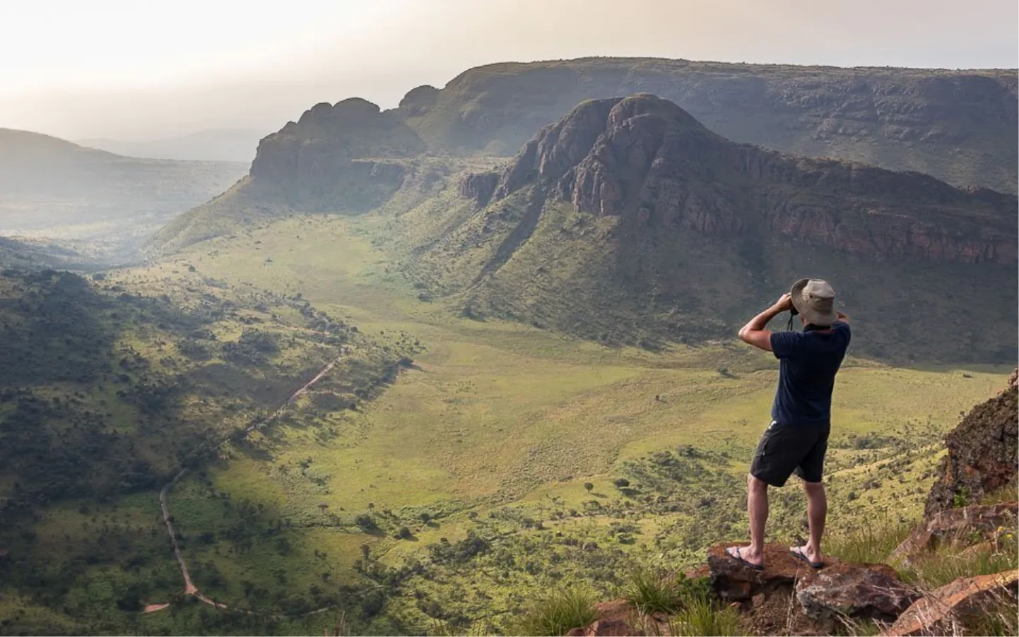 a man standing on a mountain
